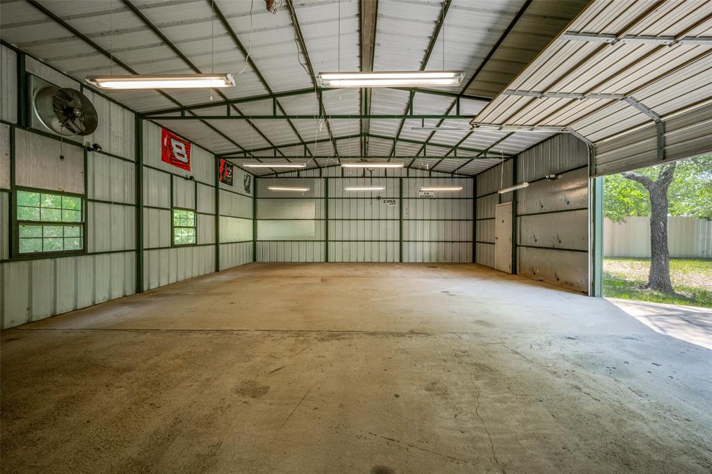 119 Private Road 1186 Decatur, TX 76234 - Photo 6 of 12 a view of a garage