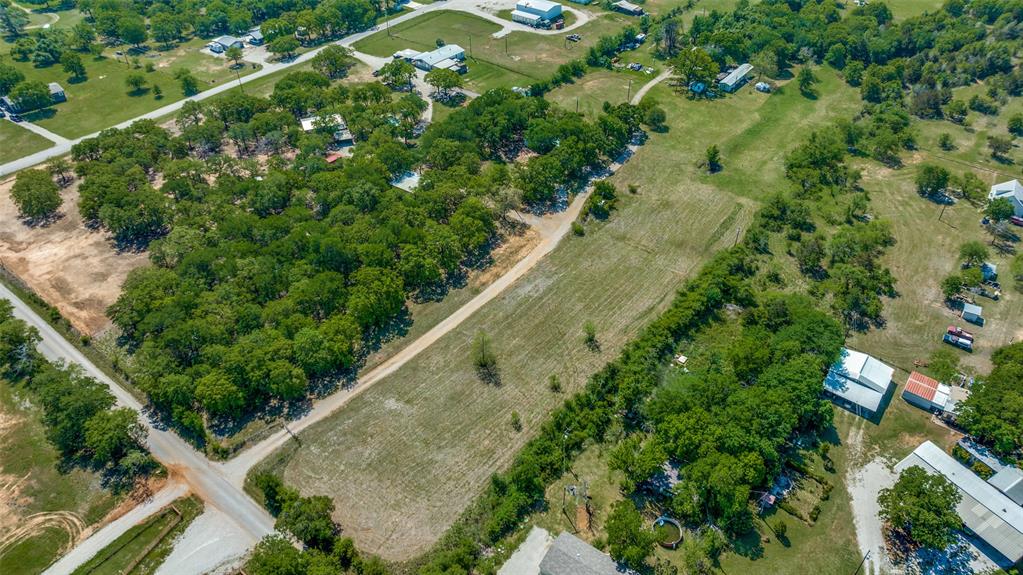 119 Private Road 1186 Decatur, TX 76234 - Photo 8 of 12 a view of a yard with a tree