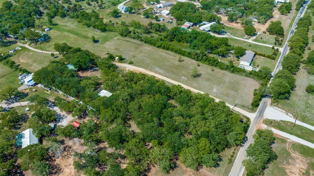 119 Private Road 1186 Decatur, TX 76234 - Photo 9 of 12 an aerial view of residential houses with outdoor space and trees all around