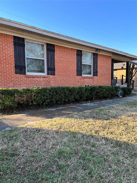 a front view of a house with swimming pool