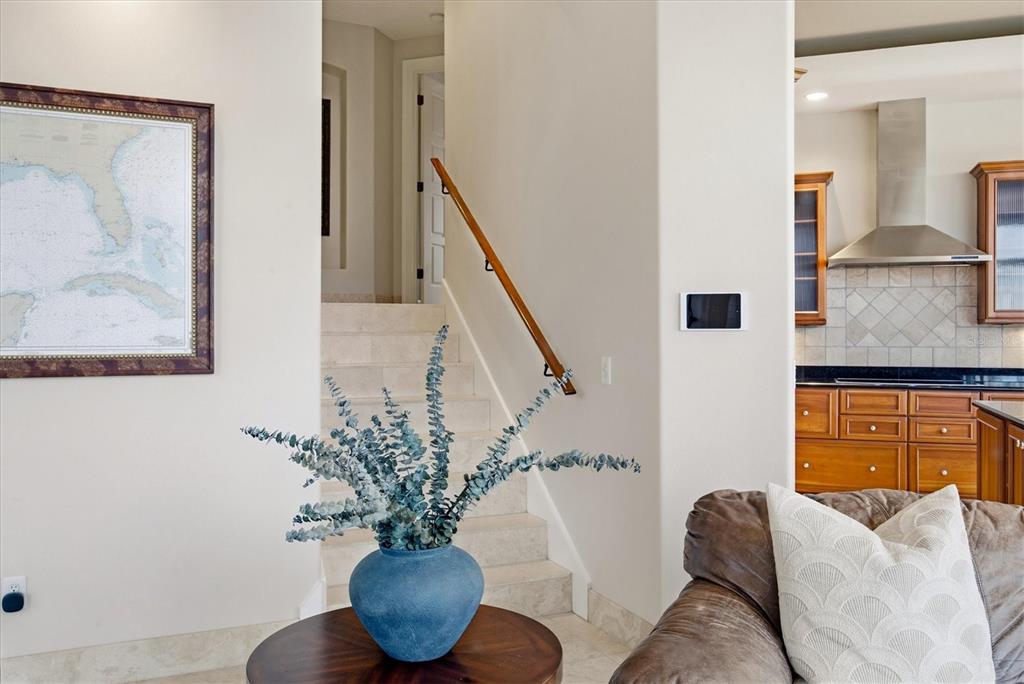 761 Norton Street Longboat Key, FL 34228 - Photo 23 of 66 a living room with furniture and flowers