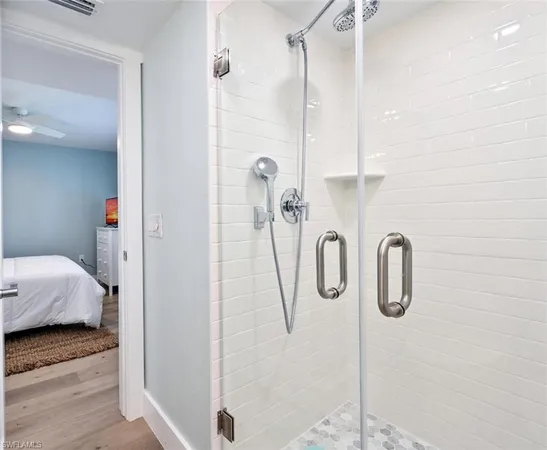 a bathroom with a sink and shower