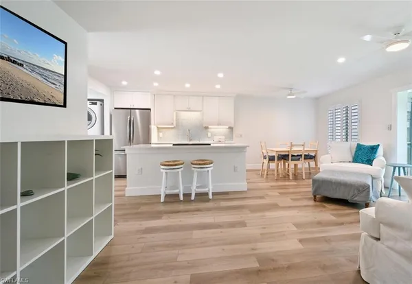 a living room with furniture and a table