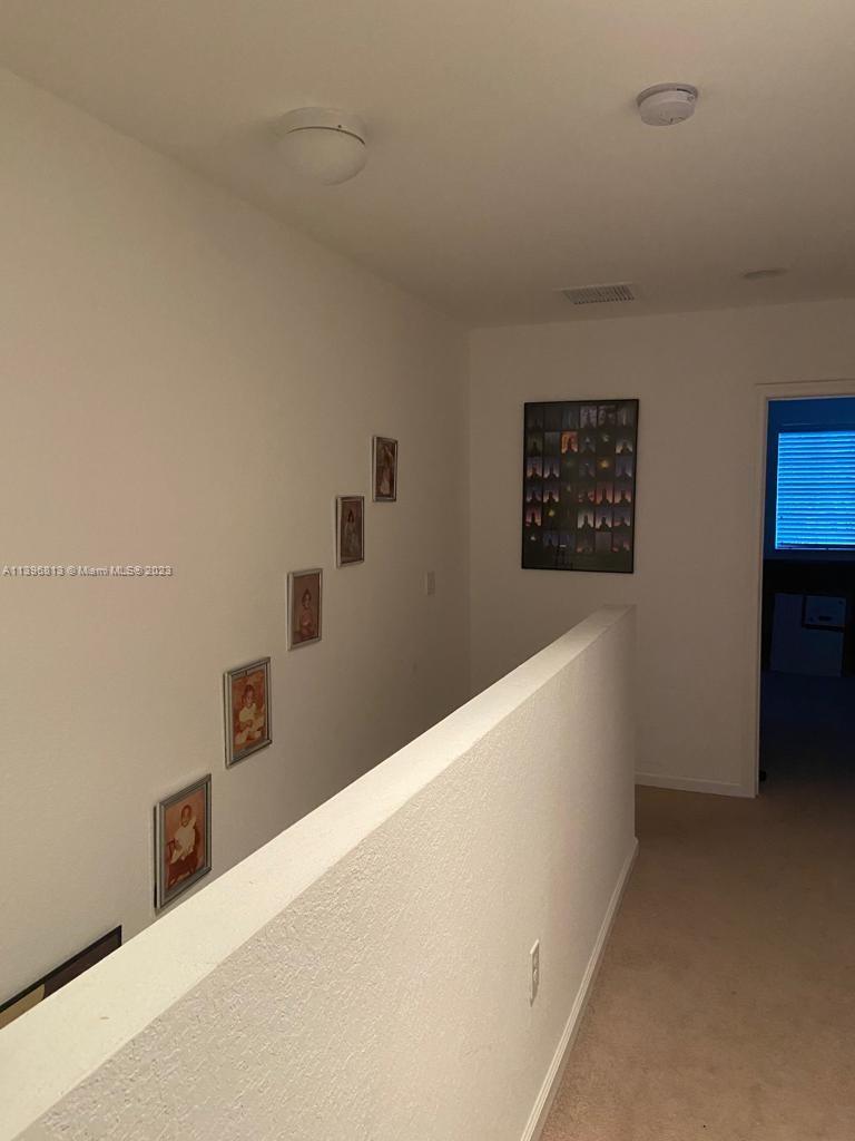 7765 Paddock Place, Unit 7765 Davie, FL 33328 - Photo 26 of 40 a view of hallway