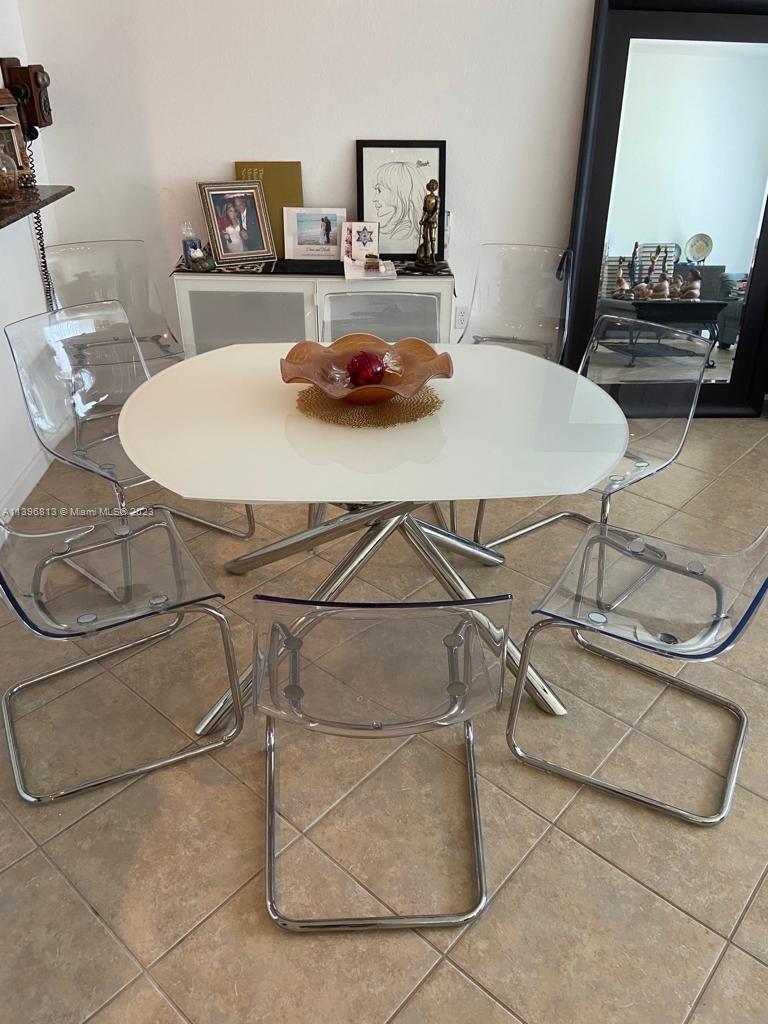 7765 Paddock Place, Unit 7765 Davie, FL 33328 - Photo 31 of 40 a dining room table in a room