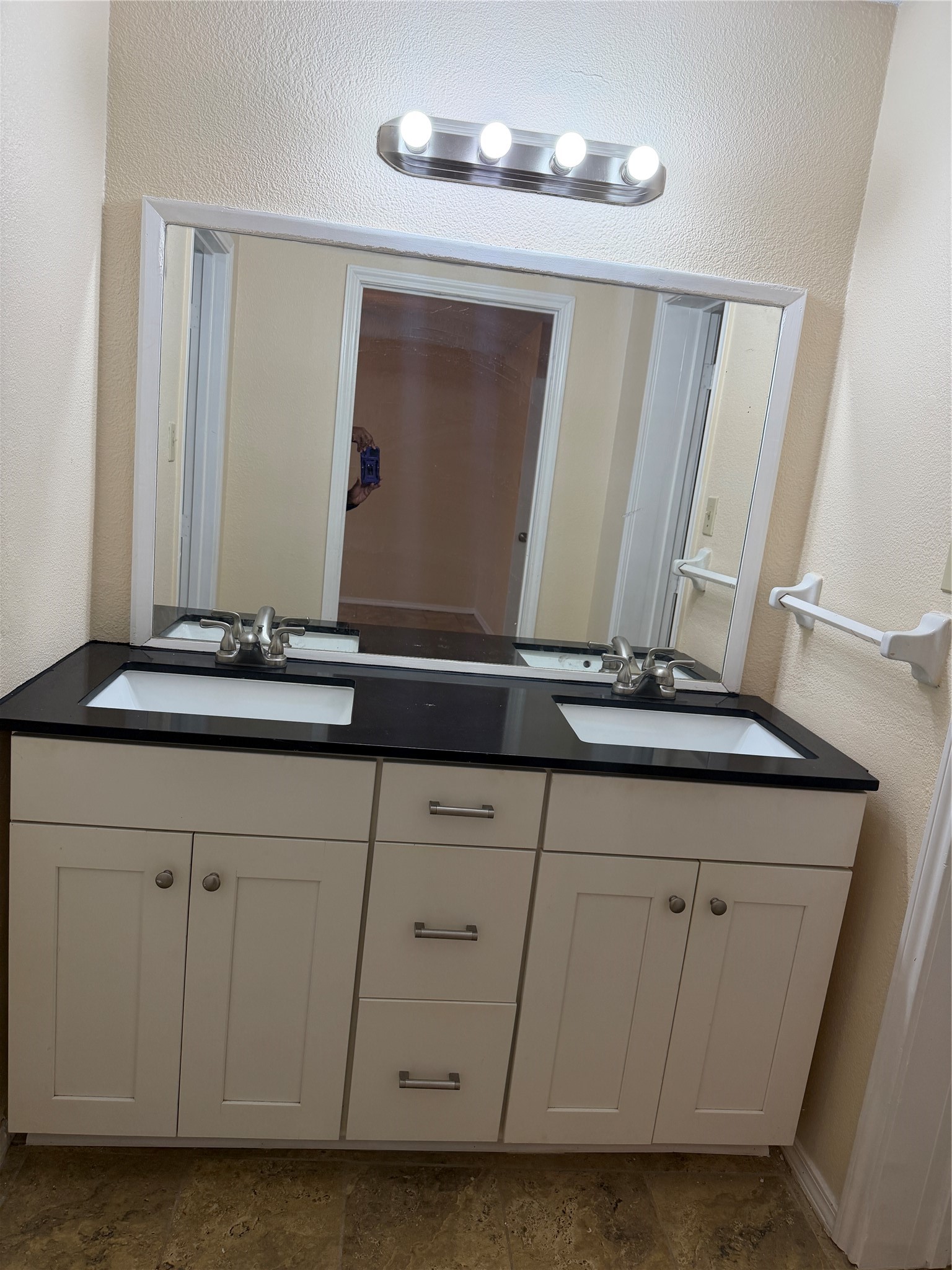 9 Dewthread Court Spring, TX 77380 - Photo 18 of 24 a bathroom with a sink and a mirror