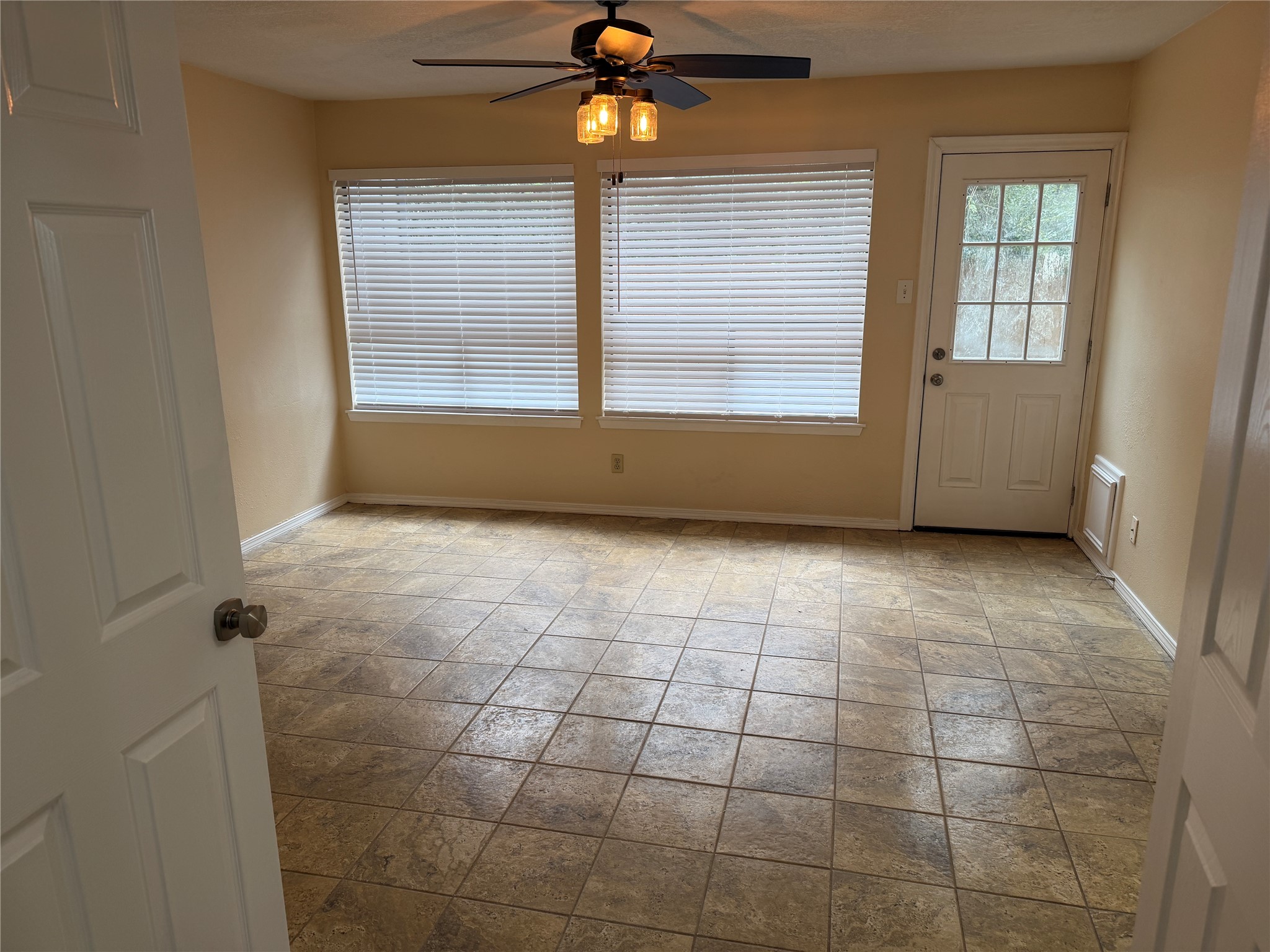 9 Dewthread Court Spring, TX 77380 - Photo 19 of 24 a view of an empty room with a window