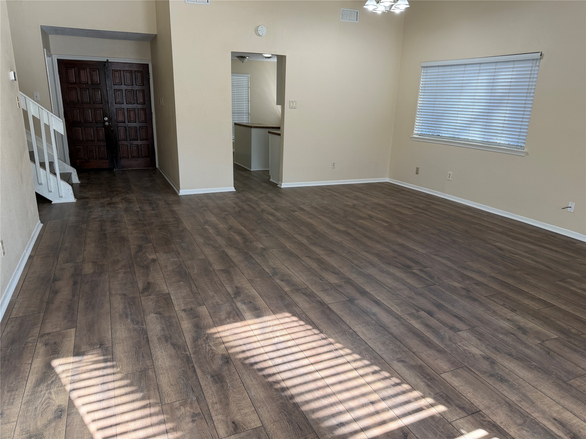 9 Dewthread Court Spring, TX 77380 - Photo 3 of 25 a view of empty room with wooden floor