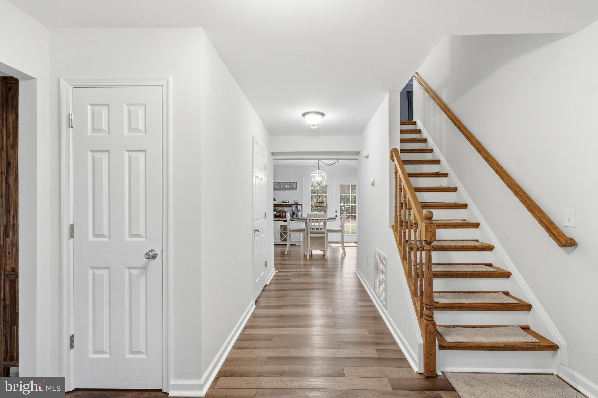 2550 Port Tobacco Road Nanjemoy, MD 20662 - Photo 17 of 70 a view of a hallway with wooden floor and entryway