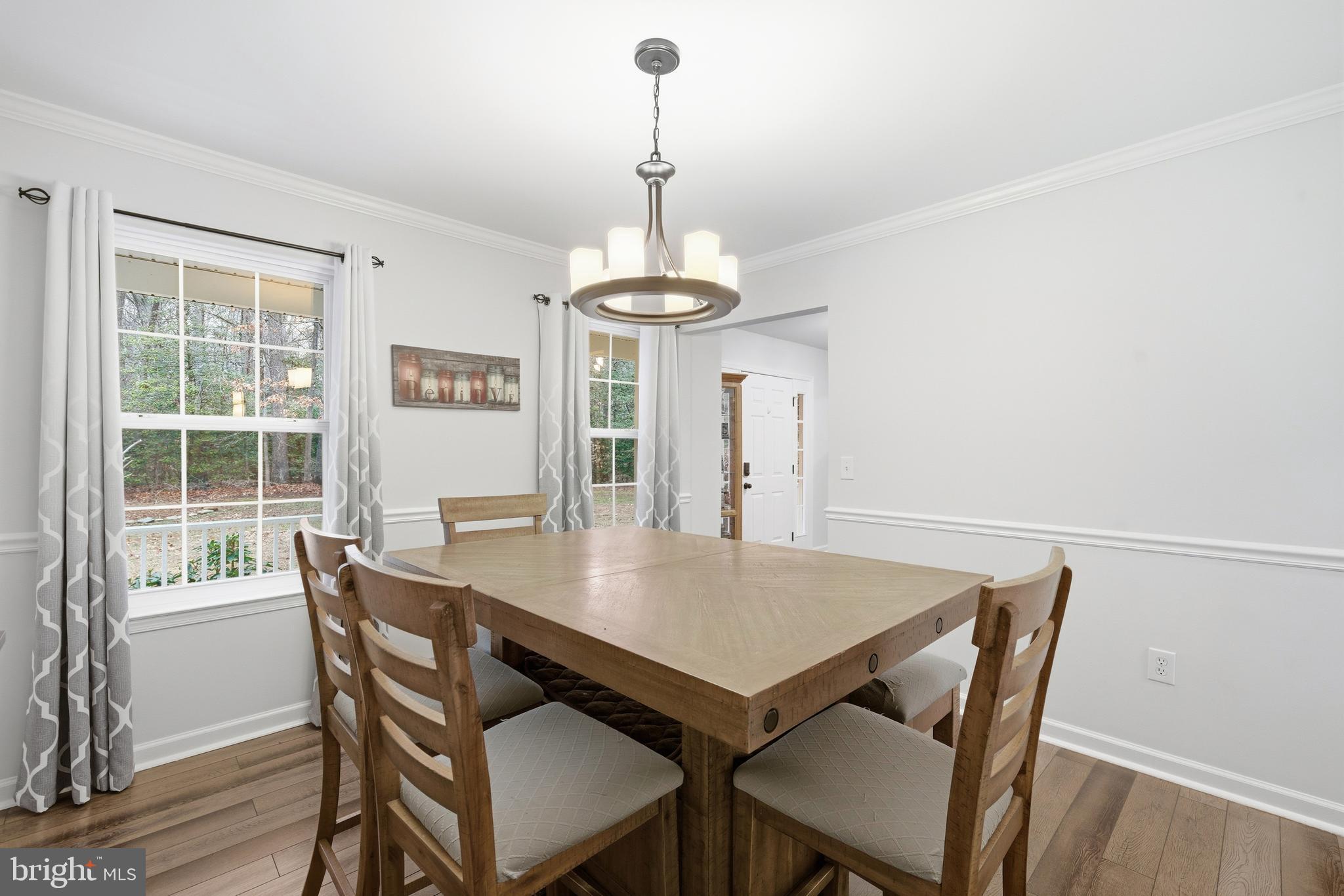 2550 Port Tobacco Road Nanjemoy, MD 20662 - Photo 18 of 70 a view of a dining room with a table and chairs