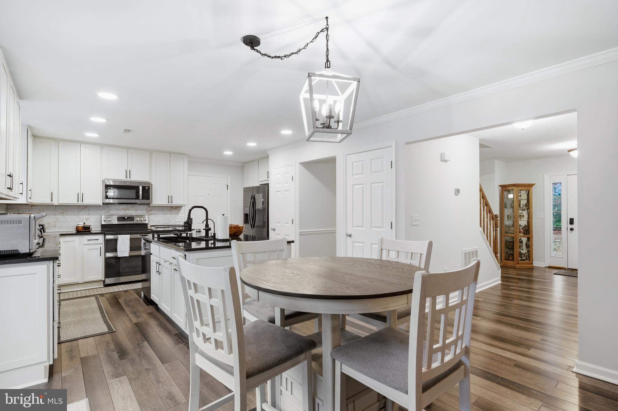 2550 Port Tobacco Road Nanjemoy, MD 20662 - Photo 19 of 70 a view of a dining room with furniture and wooden floor