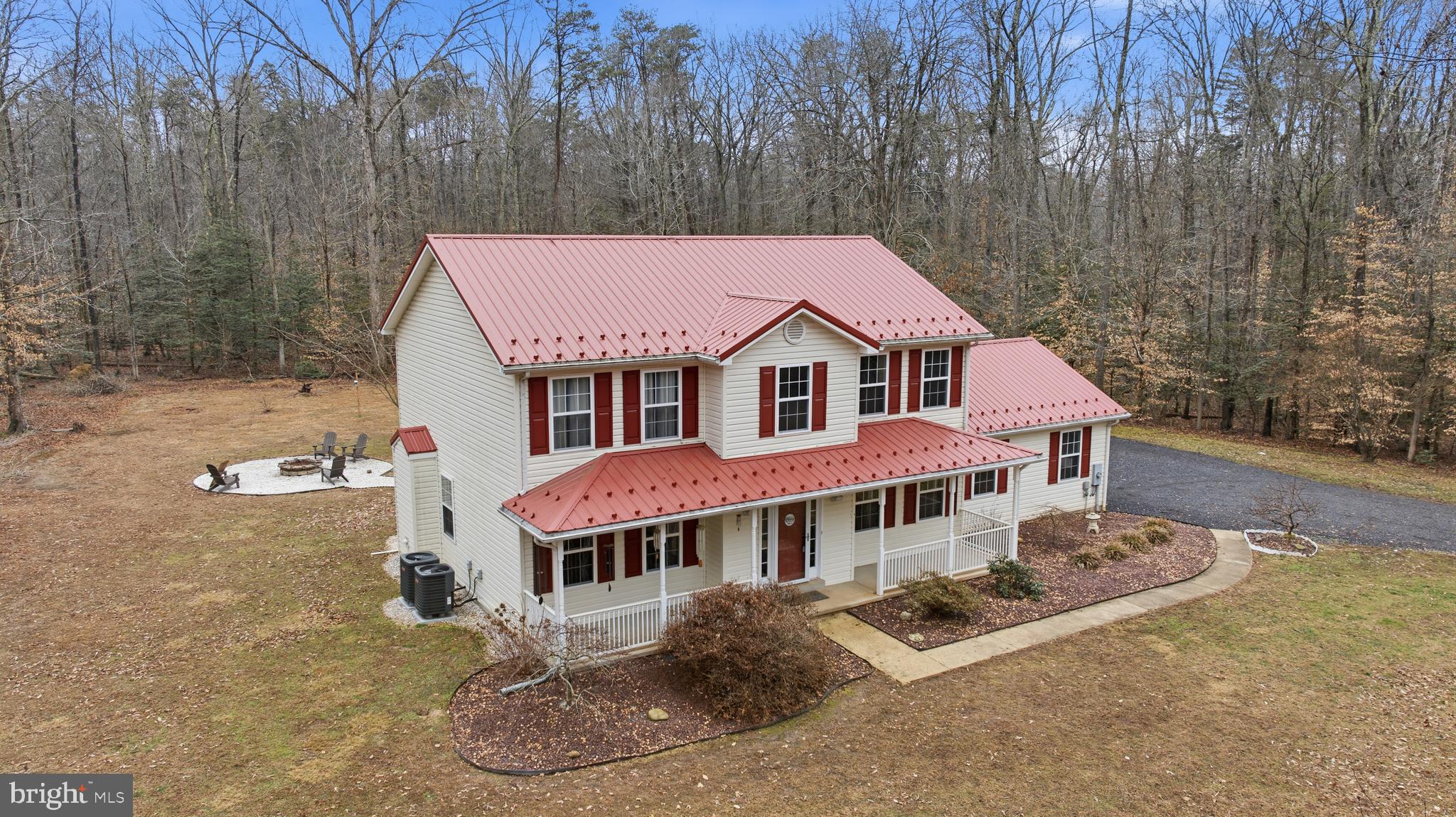 2550 Port Tobacco Road Nanjemoy, MD 20662 - Photo 2 of 70 a aerial view of a house with a yard and balcony