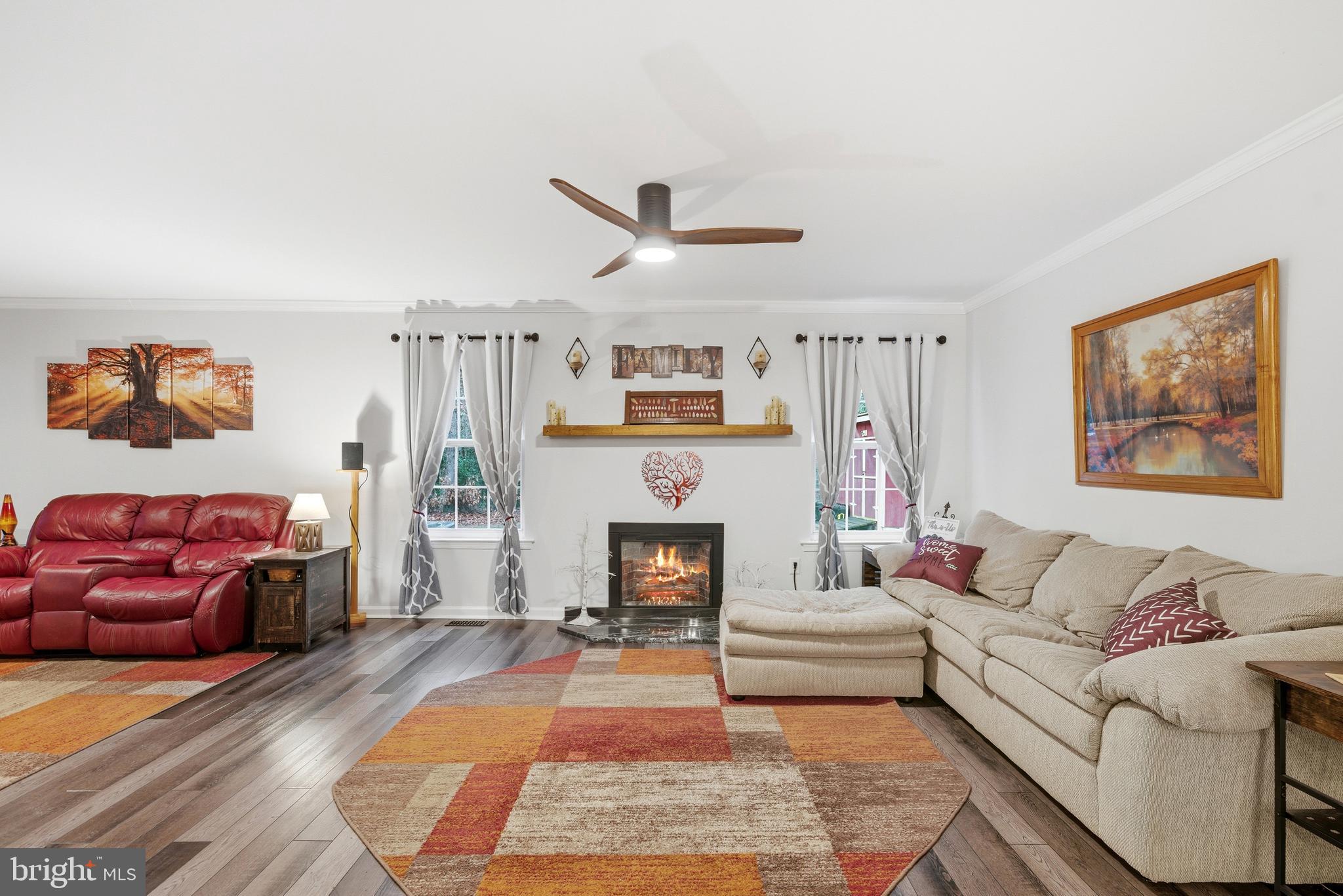 2550 Port Tobacco Road Nanjemoy, MD 20662 - Photo 31 of 70 a living room with furniture and a fireplace