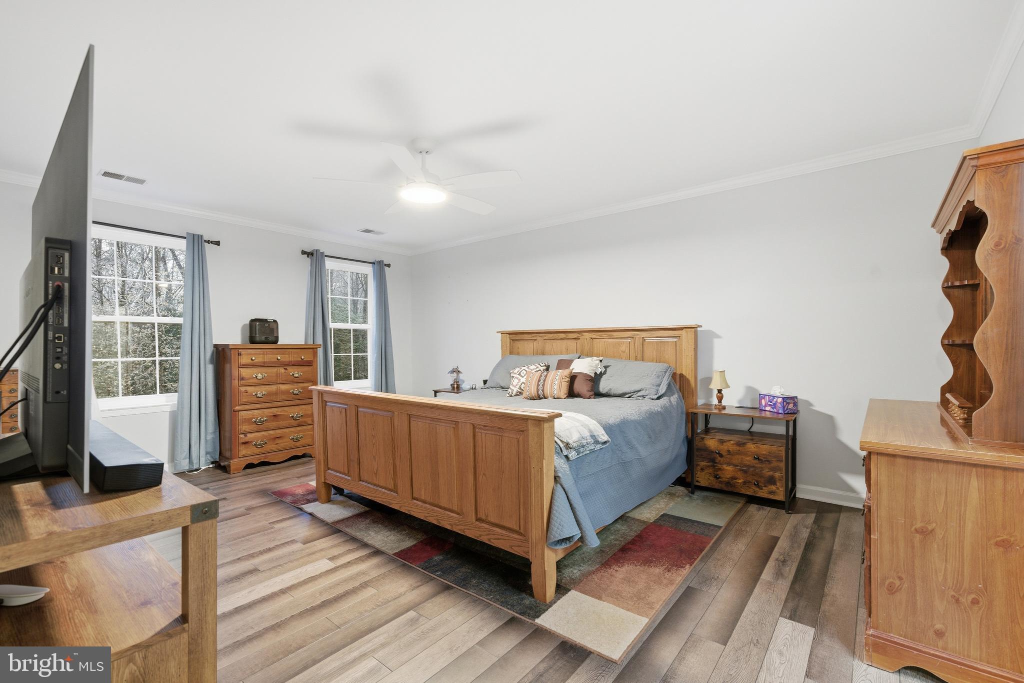 2550 Port Tobacco Road Nanjemoy, MD 20662 - Photo 36 of 70 a bed room with a bed and wooden floor