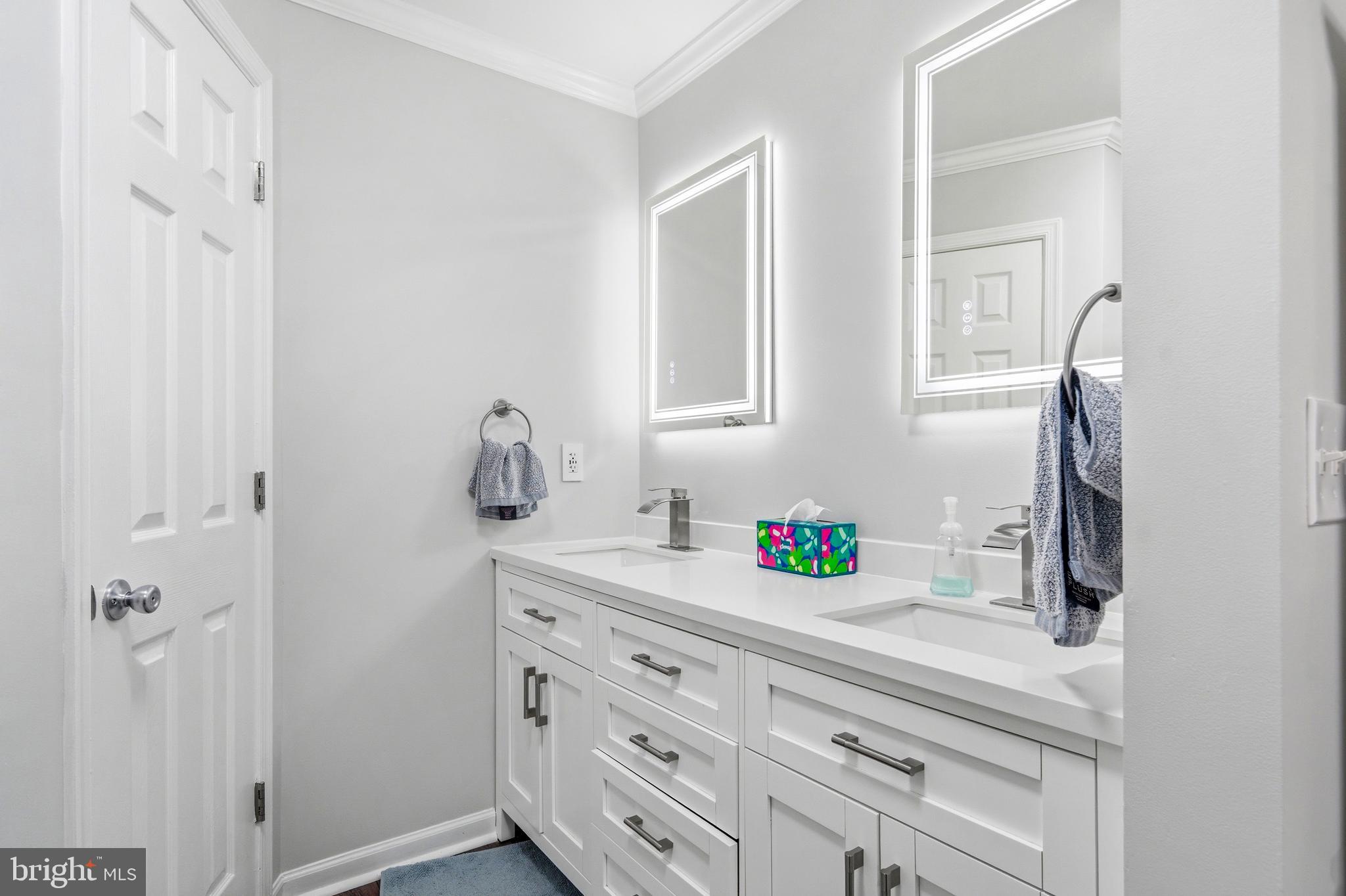 2550 Port Tobacco Road Nanjemoy, MD 20662 - Photo 38 of 70 a bathroom with a sink vanity and mirror