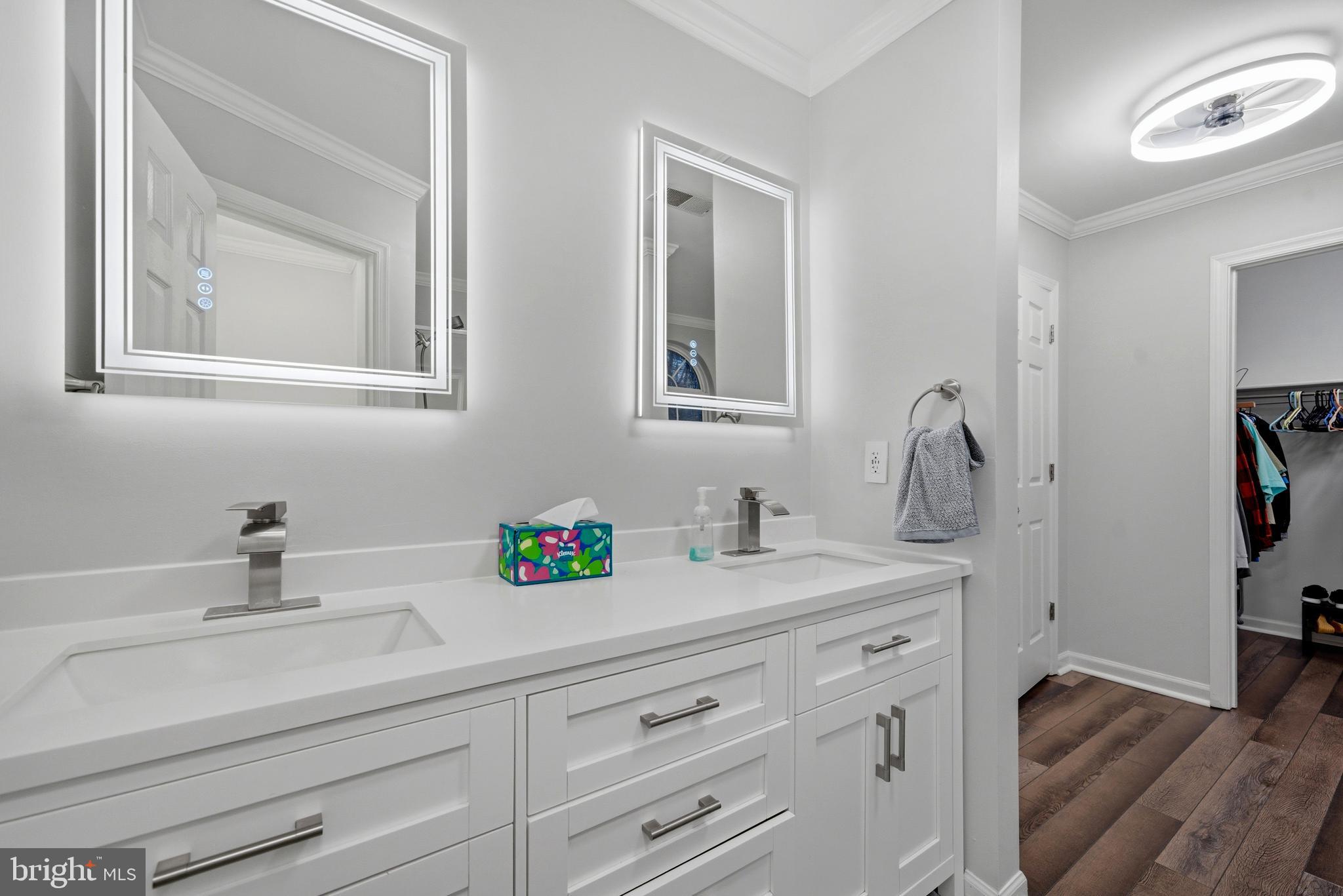2550 Port Tobacco Road Nanjemoy, MD 20662 - Photo 39 of 70 a bathroom with double vanity sink and a mirror