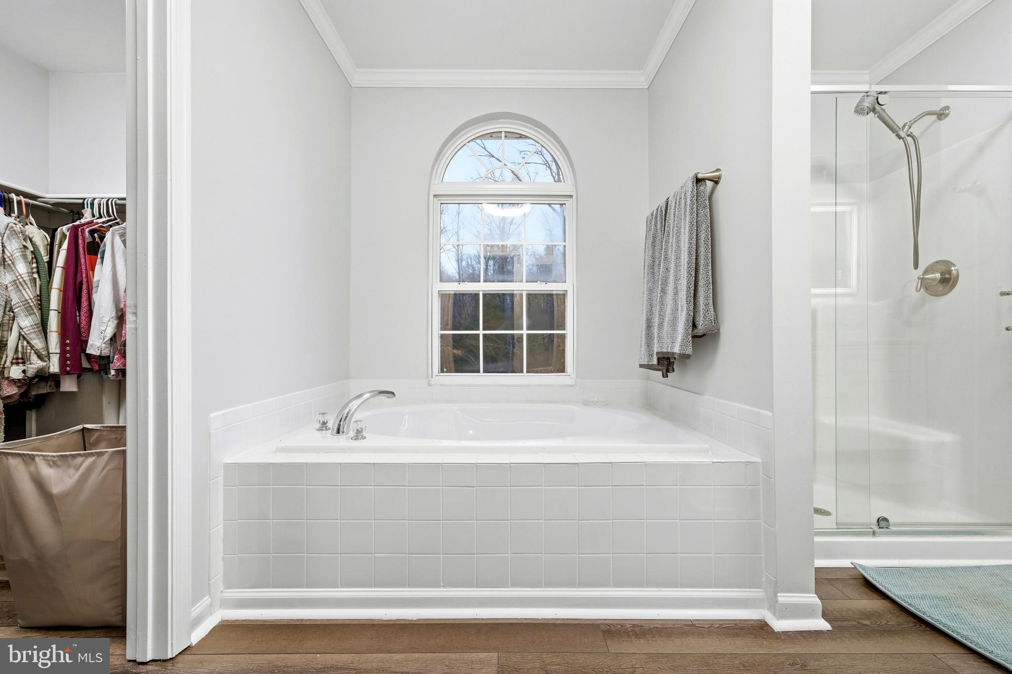 2550 Port Tobacco Road Nanjemoy, MD 20662 - Photo 41 of 70 a bathroom with a tub a sink and a window