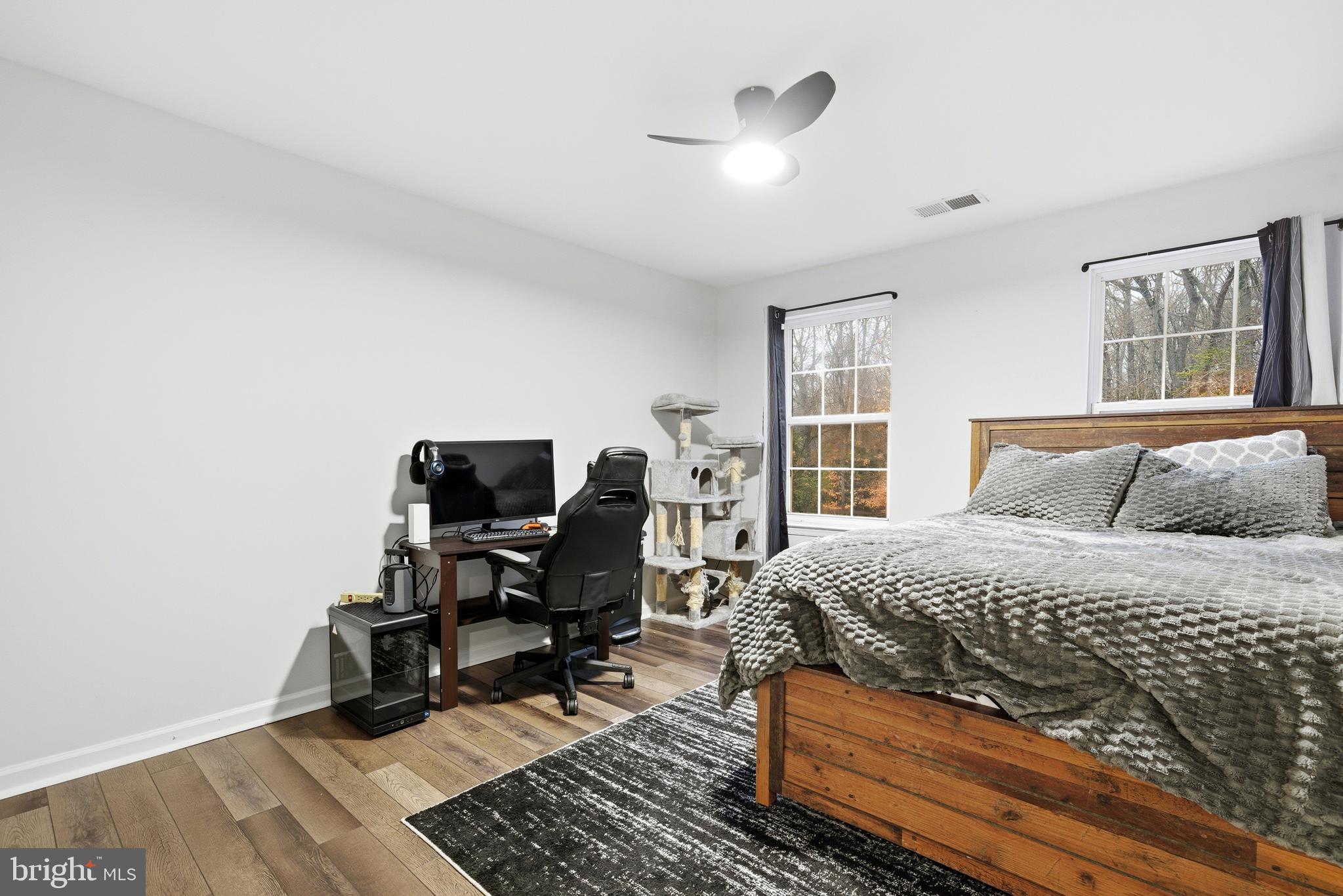 2550 Port Tobacco Road Nanjemoy, MD 20662 - Photo 50 of 70 a bedroom with a bed and wooden floor