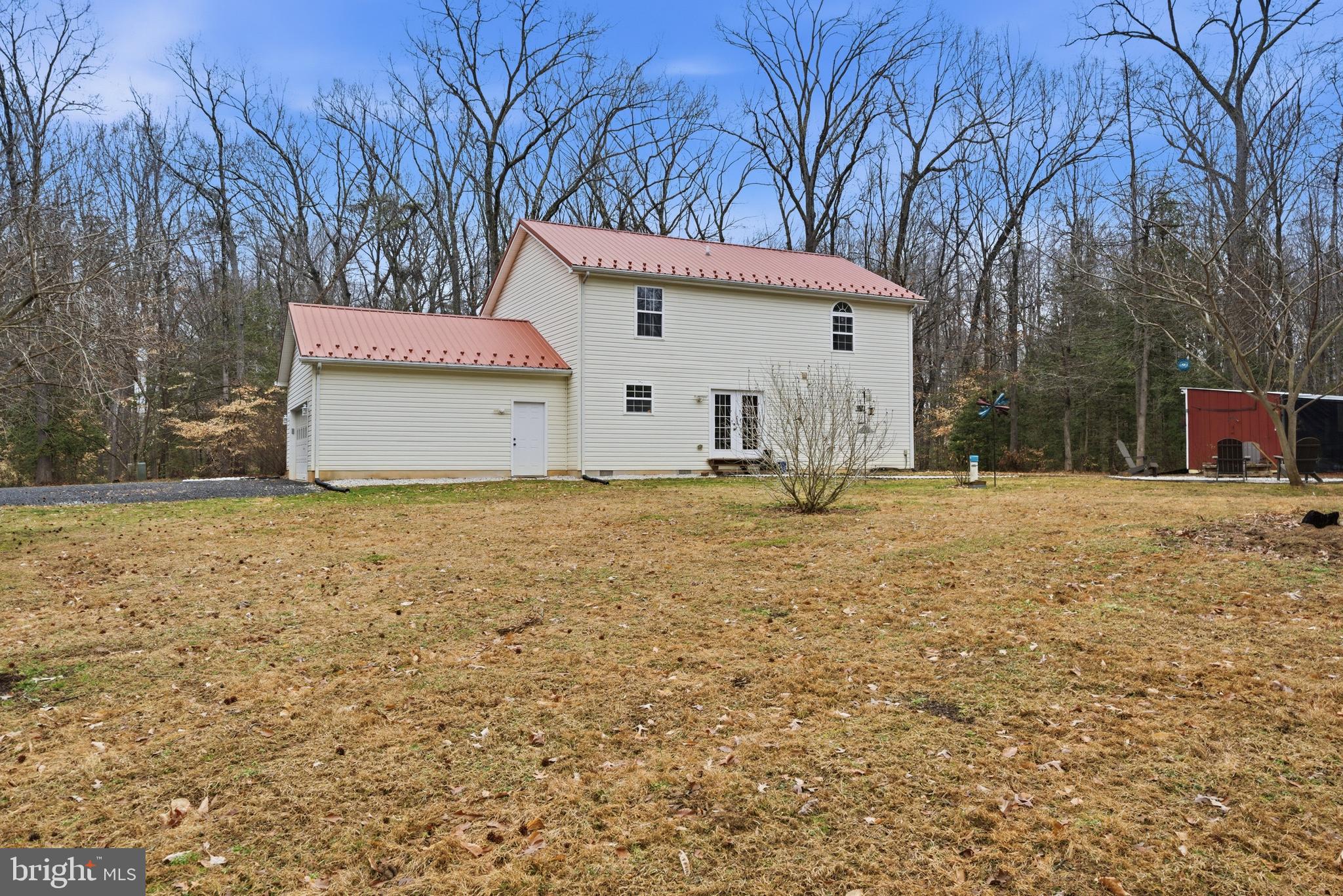 2550 Port Tobacco Road Nanjemoy, MD 20662 - Photo 56 of 70 a front view of house with yard and trees