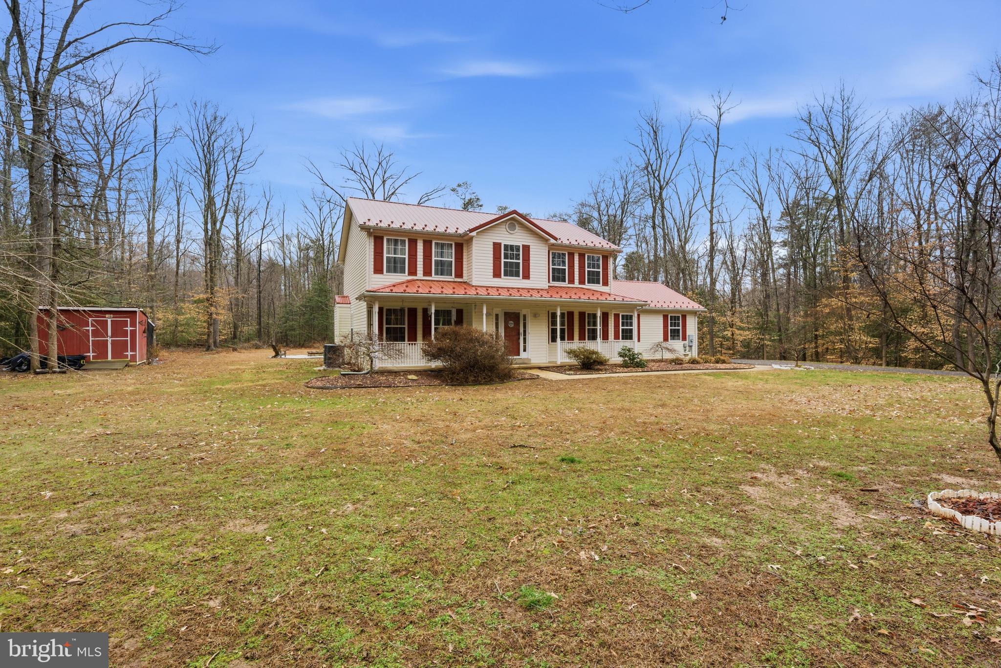 2550 Port Tobacco Road Nanjemoy, MD 20662 - Photo 69 of 70 a front view of a house with a yard