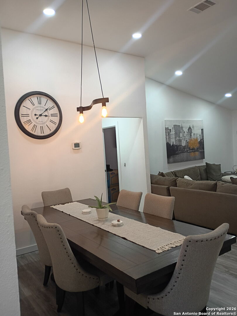 6723 Raintree Path San Antonio, TX 78233 - Photo 8 of 11 a view of a dining room with furniture