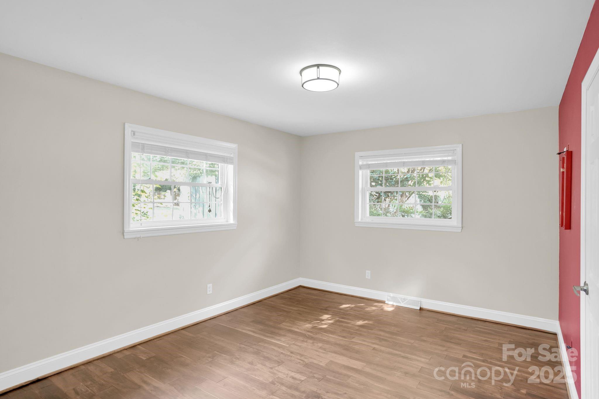 539 Hollis Road Charlotte, NC 28209 - Photo 11 of 23 an empty room with a window