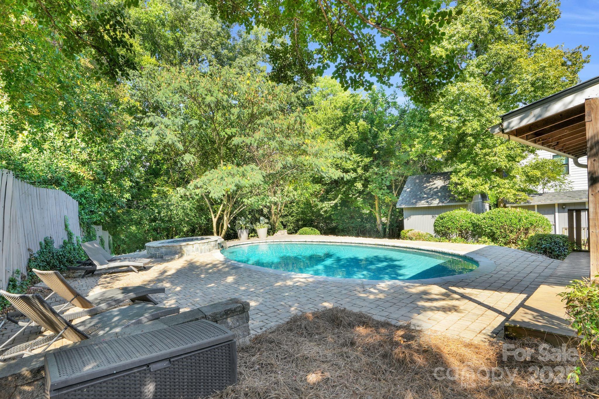 539 Hollis Road Charlotte, NC 28209 - Photo 18 of 23 a backyard of a house with yard and trampoline