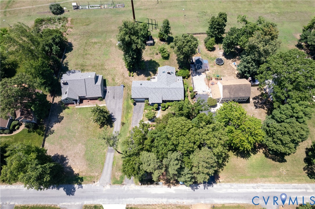 617 Rebel Ridge Road Colonial Heights, VA 23834 - Photo 10 of 49 an aerial view of a house with a yard and trees all around
