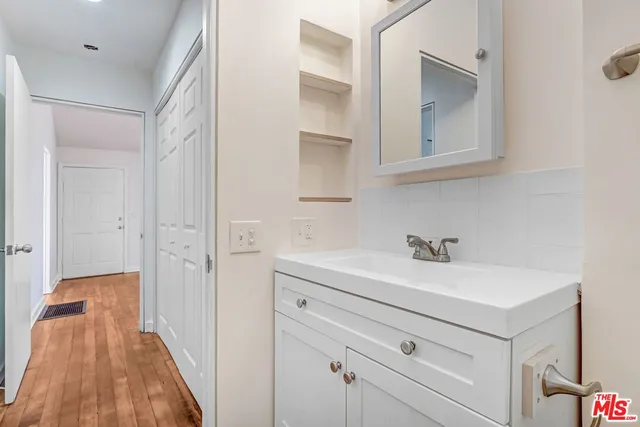 a view of bathroom with dual sinks