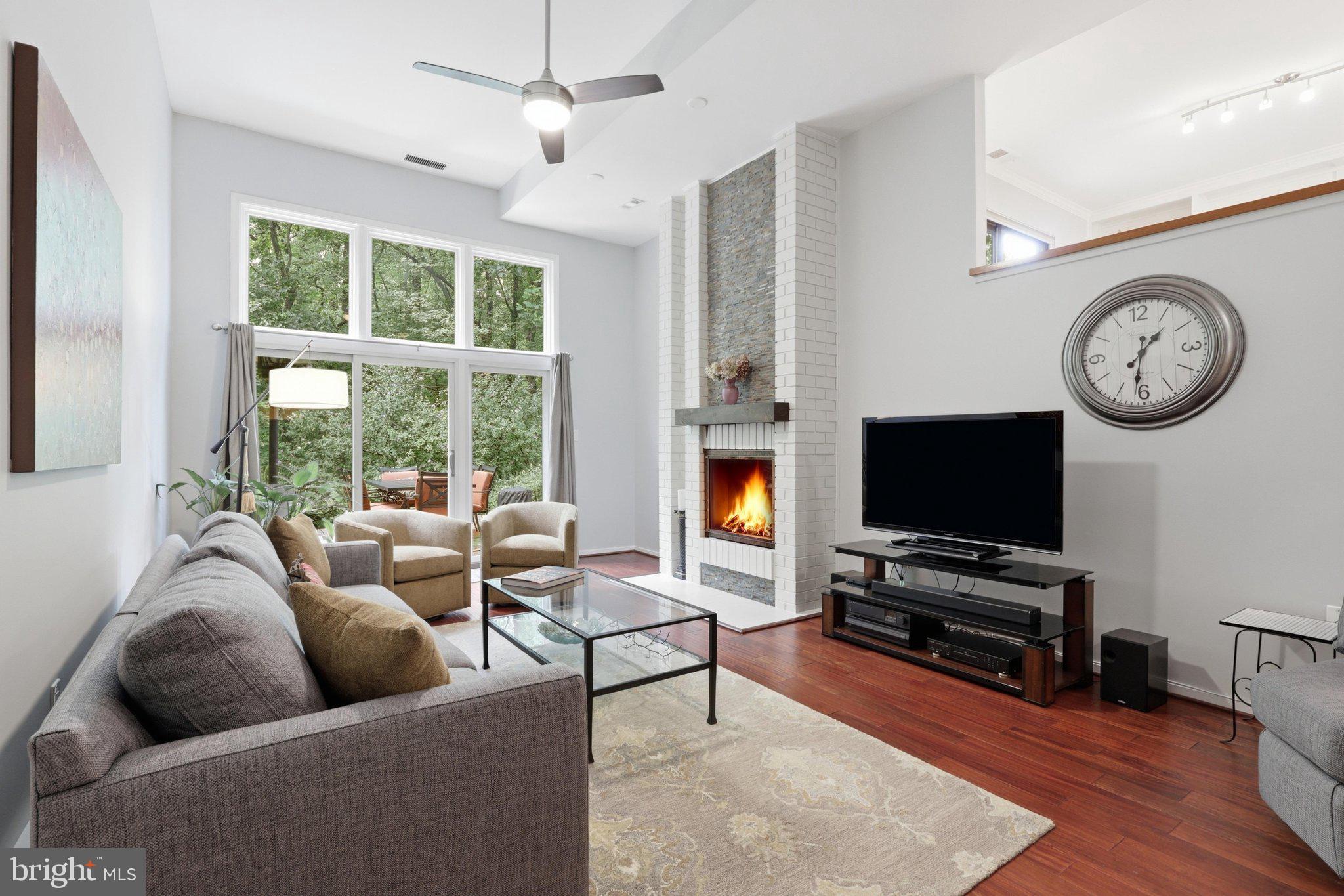 11615 Hunters Green Court Reston, VA 20191 - Photo 26 of 66 Family room w/ wood burning FP & 13 ft ceiling