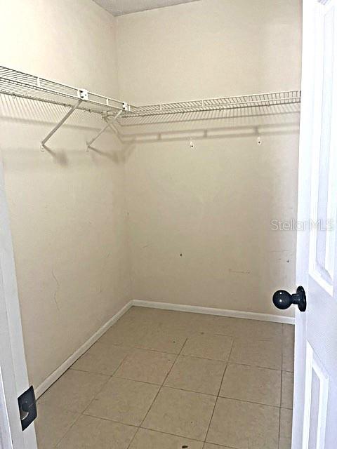 12 Pine Course Way Ocala, FL 34472 - Photo 23 of 29 a view of a room with racks on the wall