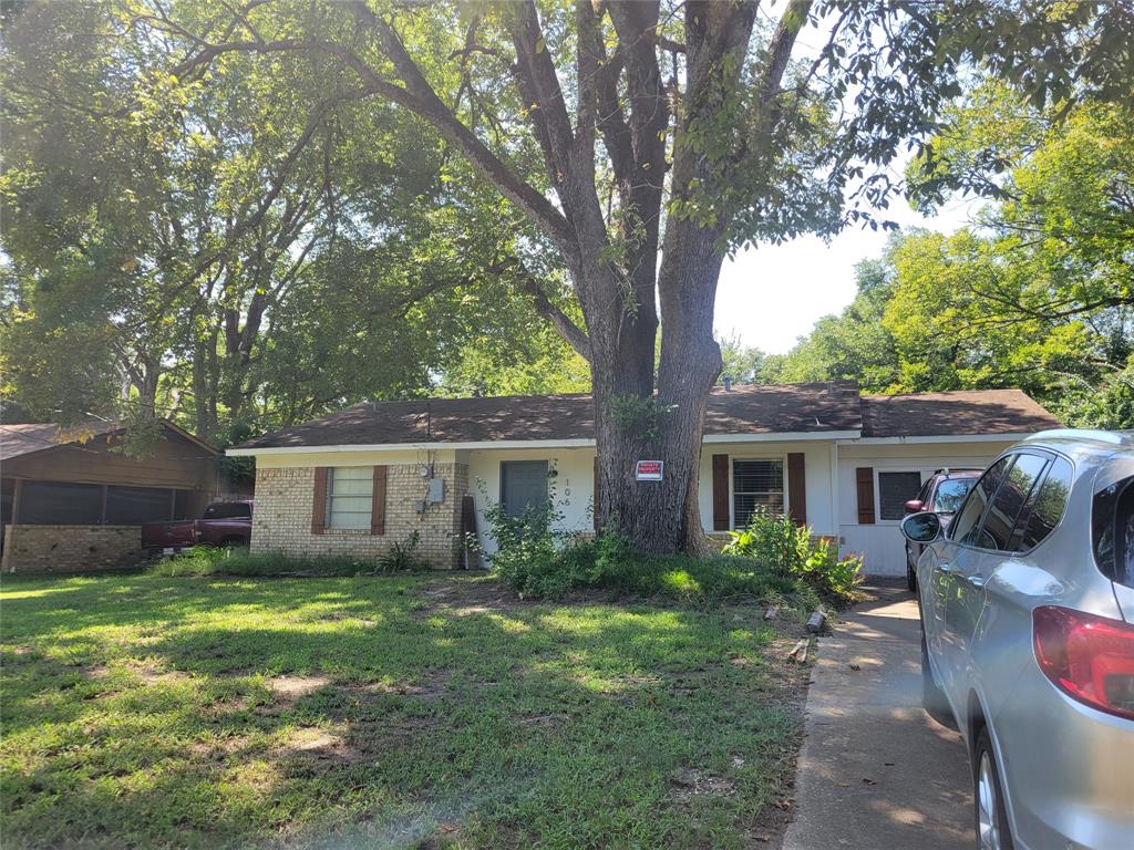 106 Allen Street Arp, TX 75750 - Photo 11 of 11 a front view of house with yard and green space