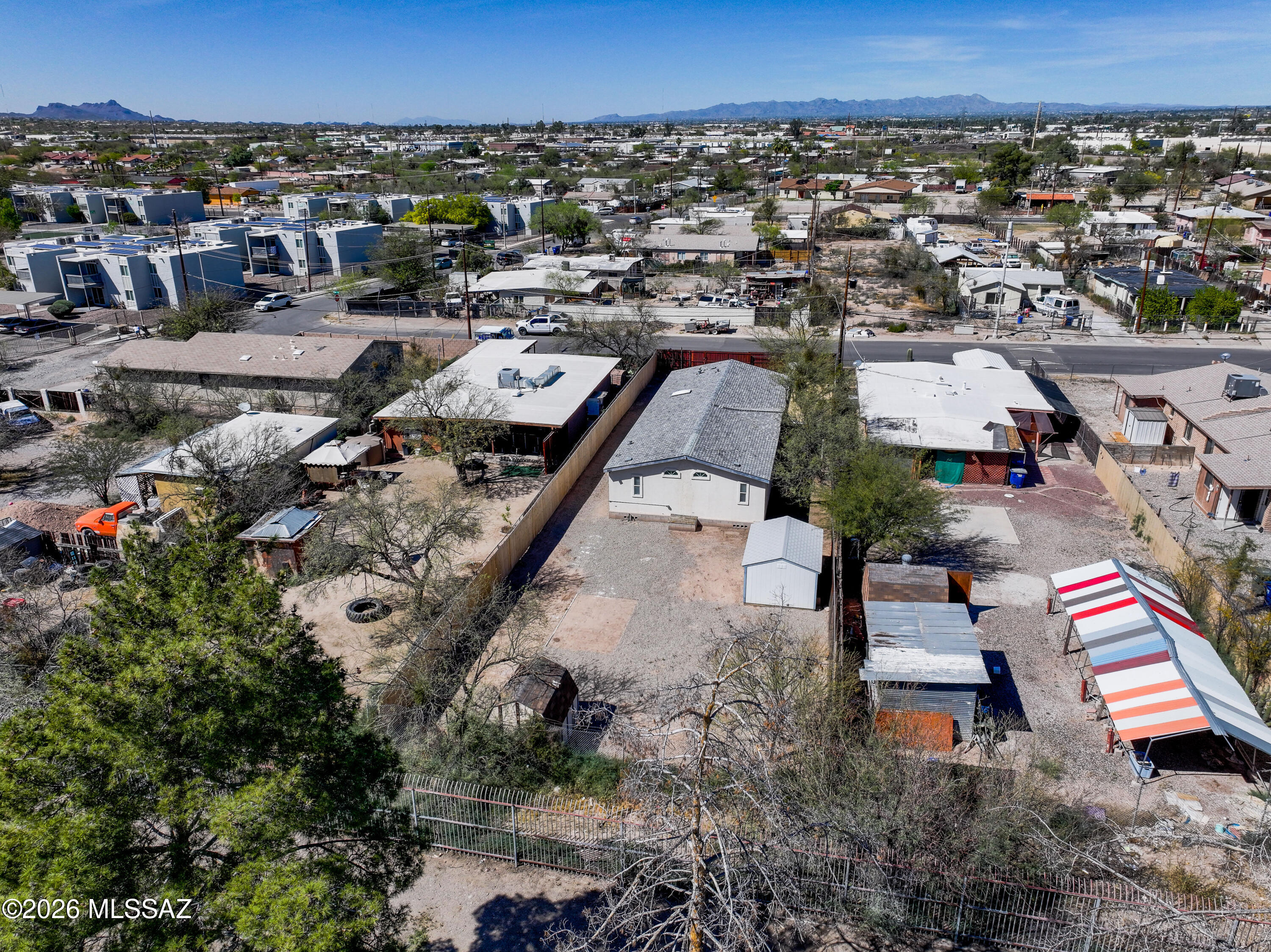 1449 West Hualpai Road Tucson, AZ 85745 - Photo 42 of 49 an aerial view of multiple houses with a yard