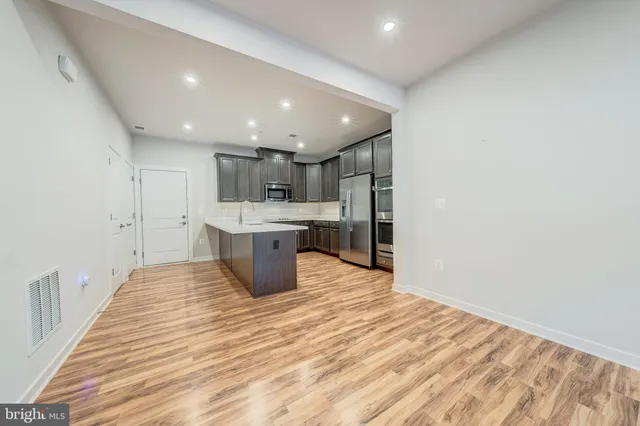 a view of kitchen with sink