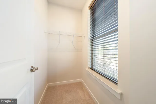 a view of a room that has a window