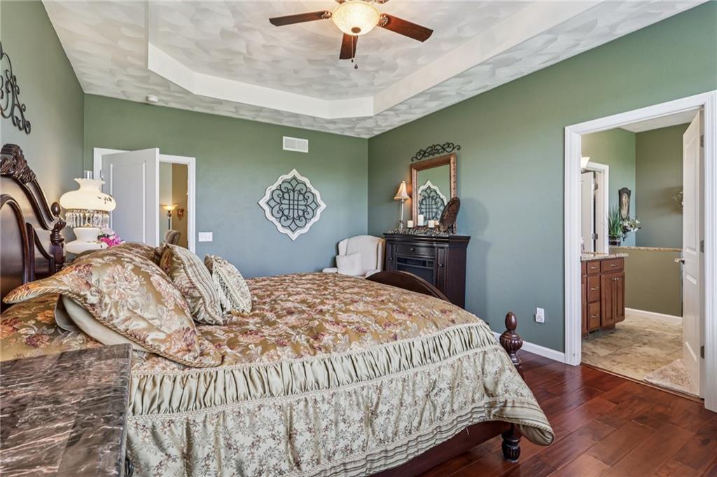 3377 Highway 982 Latrobe, PA 15650 - Photo 22 of 44 a bedroom with a bed and a chandelier