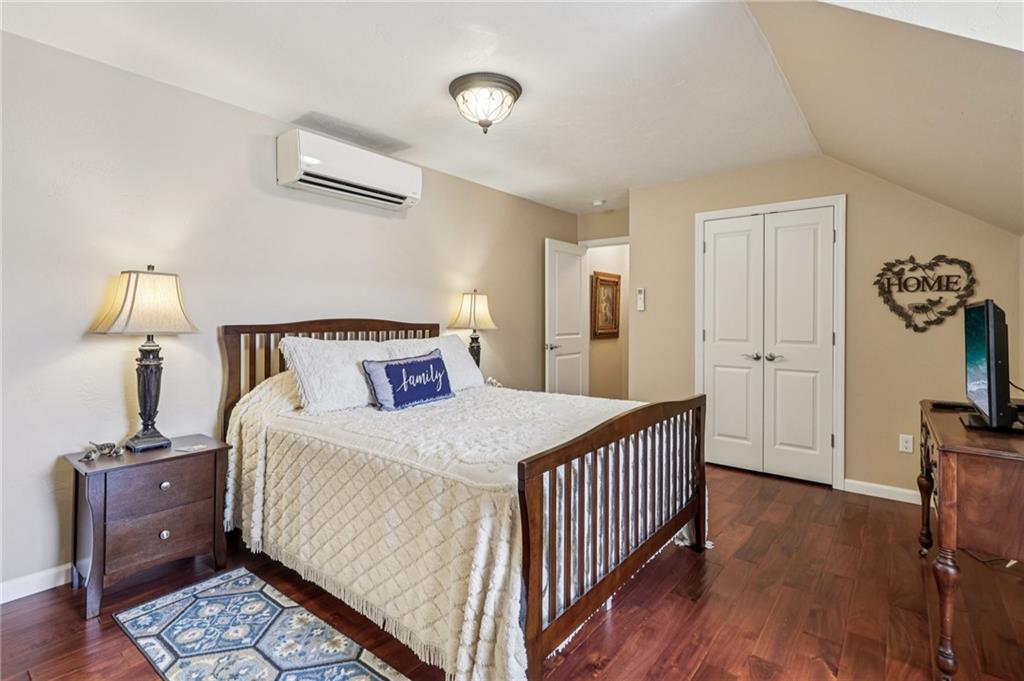 3377 Highway 982 Latrobe, PA 15650 - Photo 26 of 44 a bedroom with bed and wooden floor