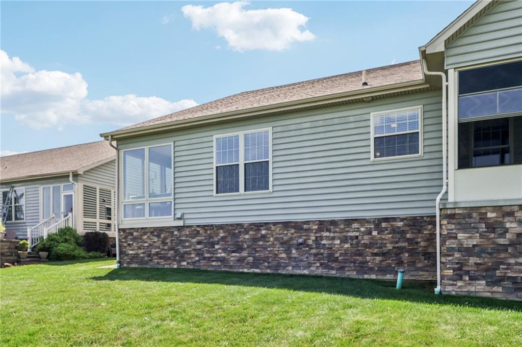 3377 Highway 982 Latrobe, PA 15650 - Photo 40 of 44 a front view of a house with a garden