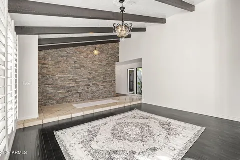 a view of a living room with a rug