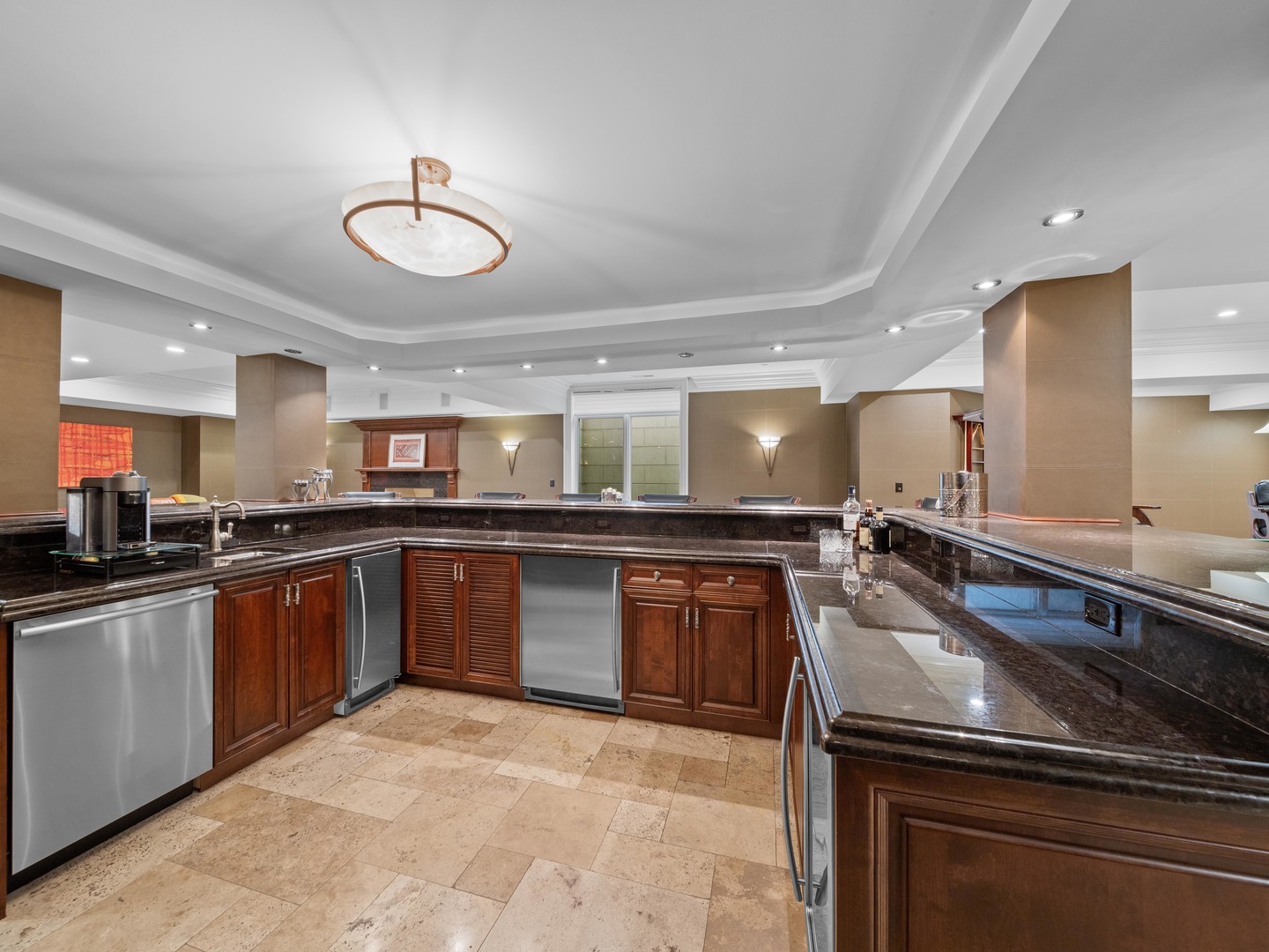 700 Greenwood Road Northbrook, IL 60062 - Photo 52 of 81 a large kitchen with stainless steel appliances granite countertop a sink and stove top oven