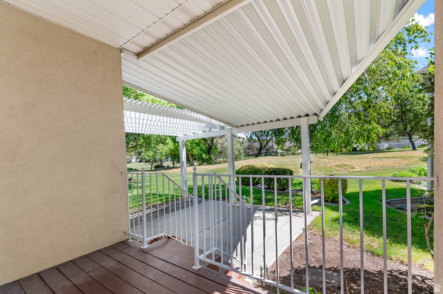 1417 Blacksmith Lane Draper, UT 84020 - Photo 45 of 57 Covered outdoor patio area featuring a slatted ceiling and wood-finish flooring