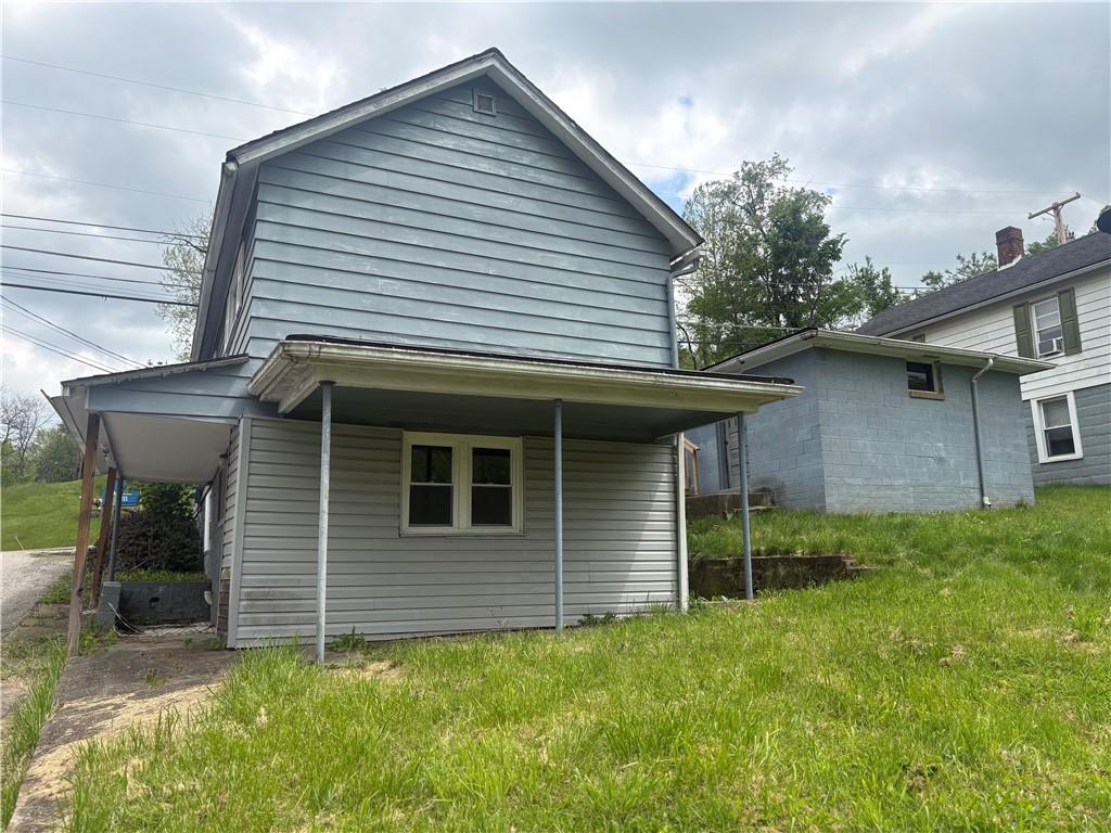 320 Beallsville Road Bentleyville, PA 15314 - Photo 4 of 26 a view of a house with a yard