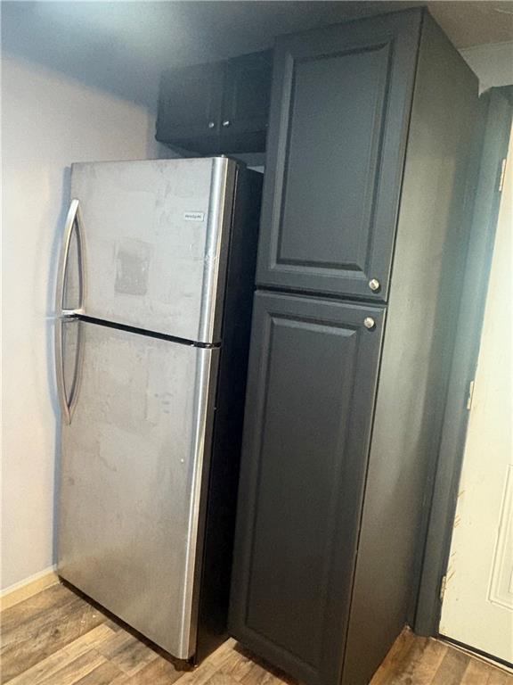 320 Beallsville Road Bentleyville, PA 15314 - Photo 7 of 26 a white refrigerator freezer and a wooden floor
