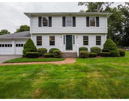 67 Newton Road Springfield, MA 01118 - Photo 1 of 41 a house view with a garden space