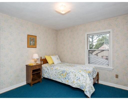67 Newton Road Springfield, MA 01118 - Photo 27 of 41 a bedroom with a bed and a window