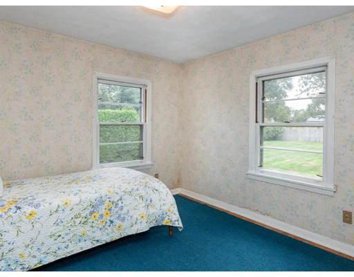 67 Newton Road Springfield, MA 01118 - Photo 29 of 41 a bedroom with a bed and window