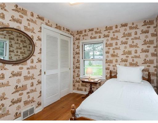 67 Newton Road Springfield, MA 01118 - Photo 31 of 41 a bedroom with a bed and a window