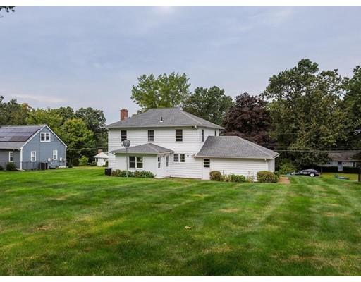 67 Newton Road Springfield, MA 01118 - Photo 41 of 41 a front view of a house with a yard and trees
