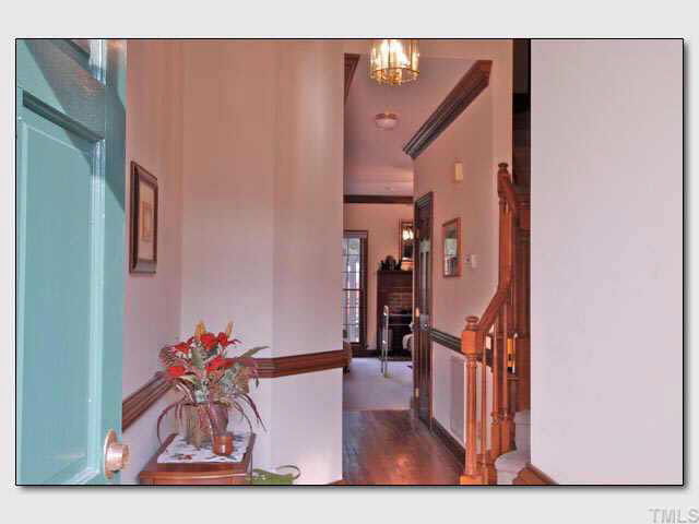 102 Skylark Way Raleigh, NC 27615 - Photo 6 of 10 Beatiful oak floors streches in the hallway with majestic stairway and cathedral celing Other