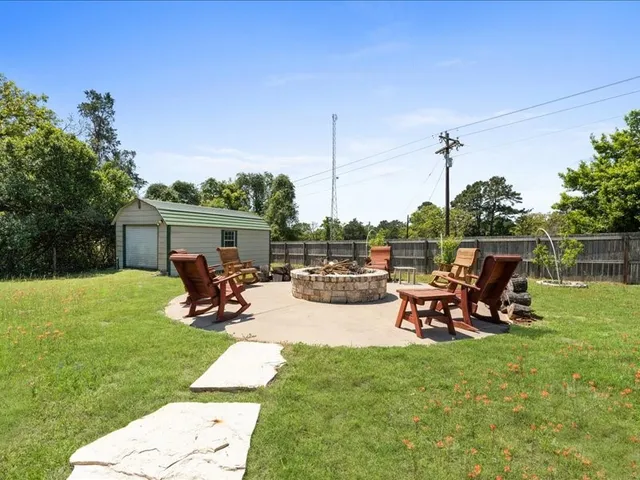 a view of a couches in backyard of house